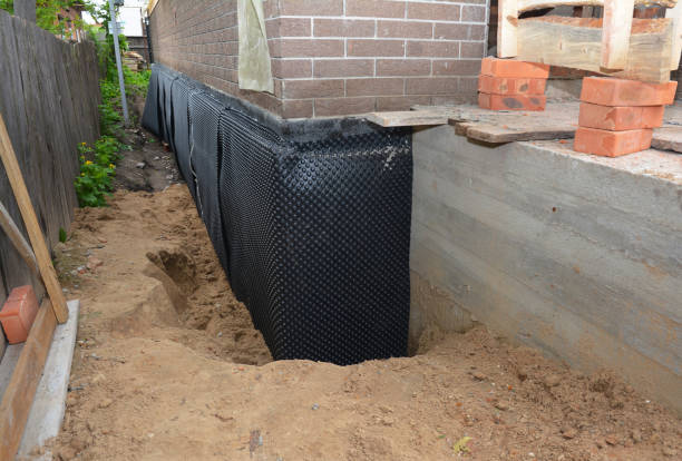 SJ Waterproofing Pros technician performing targeted Waterproofing assessment in Chagrin Falls, OH